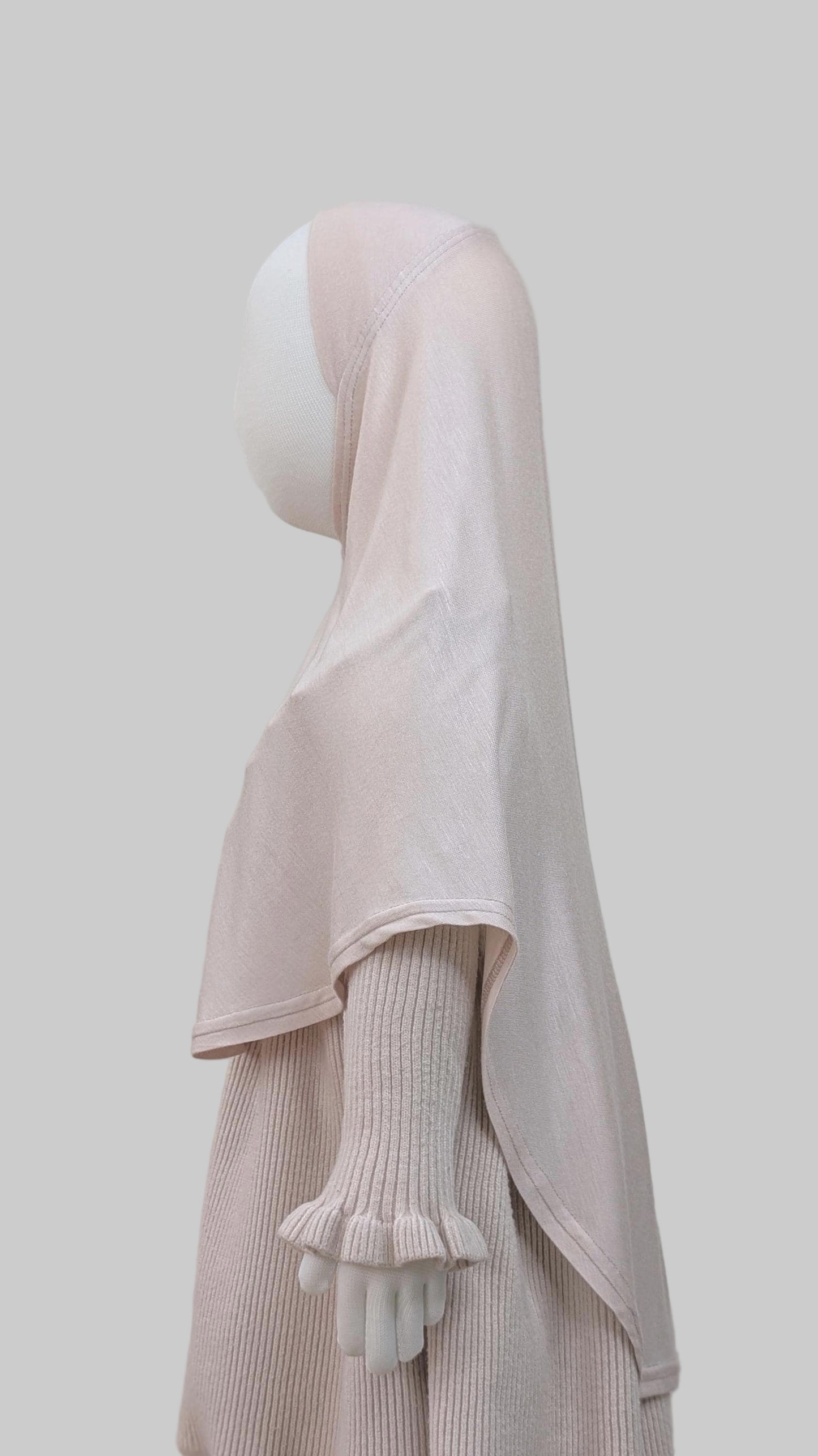 A slip-On khimar for kids.